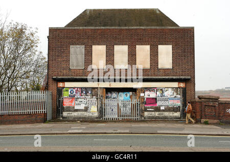 Former railway premises and old buildings stand disused or demolished as new development progresses at the MG Rover cars plant in Longbridge, Birmingham Stock Photo