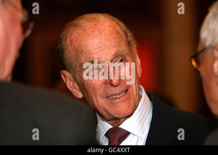 The Duke of Edinburgh speaks to designers at a reception at Buckingham Palace, London, where the Prince Philip Designers' Prize was earlier presented. Stock Photo