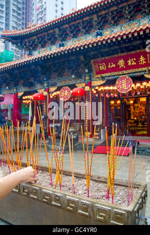 Burning incense at Wong Tai Sin Temple Stock Photo