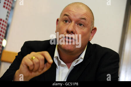 Dave Ward, deputy general secretary of the Communication Workers Union (CWU), at the CWU offices in Wimbledon, during a news conference to announce a two day national postal strike following the breakdown of talks over pay, conditions and modernisation with Royal Mail. Stock Photo