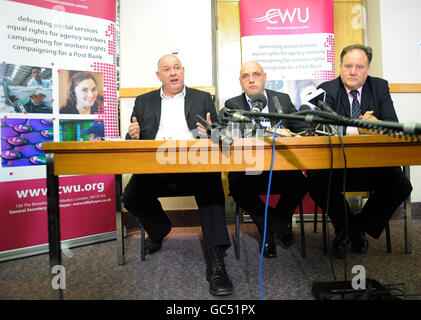 Dave Ward, (left) deputy general secretary, Kevin Slocombe,(centre) Head of Communication and Billy Hayes, General secretary, all of the Communication Workers Union (CWU), at the CWU offices in Wimbledon, during a news conference to announce a two day national postal strike following the breakdown of talks over pay, conditions and modernisation with Royal Mail. Stock Photo