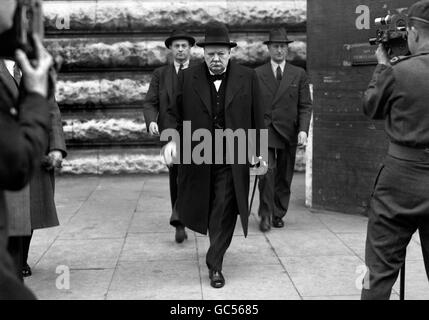 Prime Minister Winston Churchill leaving the Houses of Parliament after paying tribute to President Franklin D. Roosevelt who died from a Cerebral hemorrhage that day. Stock Photo