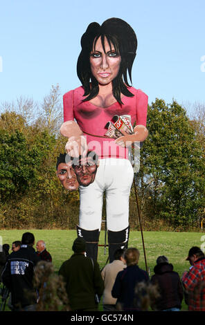 Artist Frank Shepherd puts the finishing touches to the Edenbrige Bonfire Society Celebrity Guy which has been unveiled as the model Jordan and featuring the faces of former husband Peter Andre and current partner Alex Reid. Stock Photo