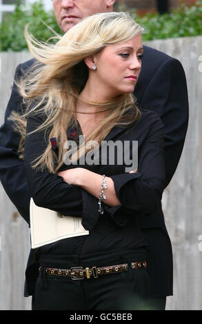 Kate Woolley, girlfriend of Guardsman Jamie Janes of the 1st Battalion Grenadier Guards, watches his coffin leave St Philips Church in Hove, East Sussex, following his death in Afghanistan earlier this month. Stock Photo