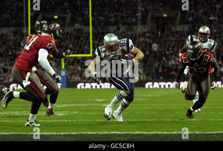 American Football - NFL - New England Patriots v Tampa Bay Buccaneers - Wembley Stadium. New England Patriots' Wes Welker runs with the ball during the NFL match at Wembley Stadium, London. Stock Photo