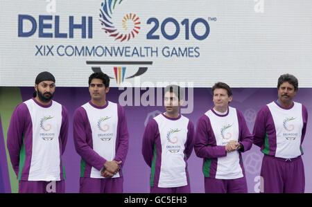 England cricketer Monty Panesar (left) Indian Olympic Games and World Championship bronze medallist boxer, Vijender Kumar, (second left) India's Olympic Gold medallist and world champion air rifle shooter Abhinav Bindra, (centre) British Olympic athlete and Chairman of the London 2012 Organising Committee, Lord Coe (second right) and Indian World Cup winning cricket captain and all rounder Kapil Dev (right) are pictured during the launch of the XIX Commonwealth games at Buckingham Palace in London. Stock Photo