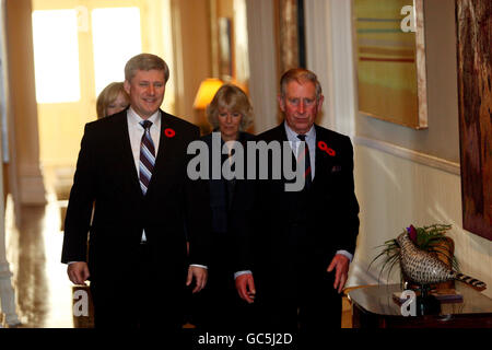 The Prince of Wales (right) accompanied by the Duchess of Cornwall met with the Prime Minister of Canada, Stephen Harper and his wife Laureen, at the Governors residence in Ottawa. Stock Photo