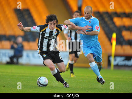 Port Vale's Louis Dodds and Rotherham United's Paul Warne Stock Photo