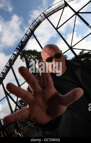 Tony Adkins, also known as 'Big Tony', stands guard outside the construction site of a new rollercoaster - codenamed 'secret weapon 6' (SW6) - which is estimated to cost 15 million, at Alton Towers Resort in Staffordshire, following an attempted break in as fans tried to unveil the attractions secret element. Stock Photo
