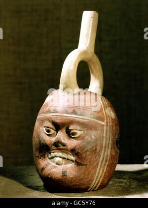 fine arts, South America, Peru, Mochica culture (Moche), handicrafts, handle can: tattooed head of a man with face mutilation as effect of the Espundia, burial object, clay, circa 600 AD, private collection, Stock Photo