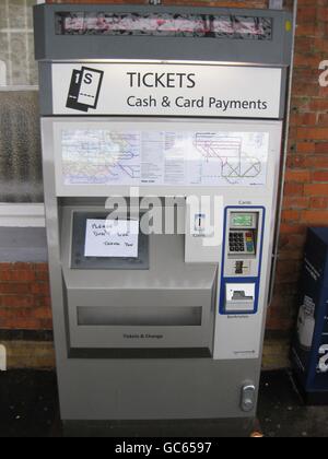 A out of use ticket machine at West Malling station as conductors refuse to issue tickets until a train is in service in Kent, as swathes of Britain were hit by a fresh wave of snow. Stock Photo