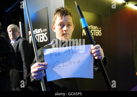 Mark Allen leaves the arena after beating John Higgins during the The Masters at Wembley Arena, London. Stock Photo