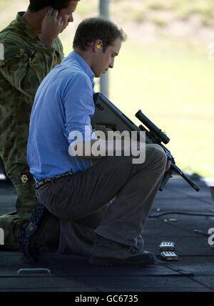 Prince William shooting an Australian military F88 Austeyr rifle at Holdworthy Army Base with soldiers of the 3rd Australian Regiment. Stock Photo