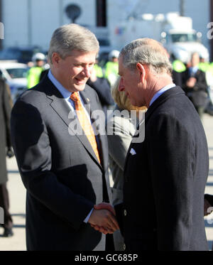 The Prince of Wales (right) shakes hands with the Prime Minister of Canada Stephen Harper at a farewell ceremony held in honour of Prince Charles and the Duchess of Cornwall, at the Canada Reception Centre in Ottawa, following their visit to Canada. Stock Photo