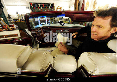 Max Tait from Northumbrian Leather in Heaton, Newcastle, with a Cadillac, which may once have belonged to Elvis Presley, that he is helping to restore. Stock Photo