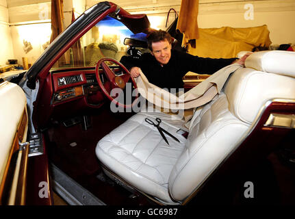 Max Tait from Northumbrian Leather in Heaton, Newcastle, with a Cadillac, which may once have belonged to Elvis Presley, that he is helping to restore. Stock Photo