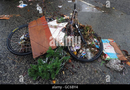 A bike is tangled with wool and other debris in Cockermouth high street after the flood water receded. Stock Photo