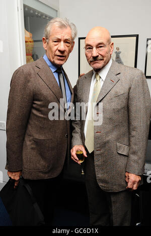 Sir Ian McKellen (left) and Patrick Stewart attend a pre-lunch reception for the Evening Standard Theatre Awards at the Royal Opera House in Covent Garden, London. Stock Photo