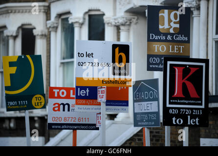 Estate agents boards are seen in Lambeth, London. Stock Photo