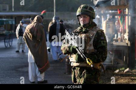 A soldier (name not supplied) training for deployment to Afghanistan in a mock Afghan village at Stanford Training Area, Norfolk after it was announced that one of the key conditions for 500 extra British troops to be sent to Afghanistan has been met. Stock Photo