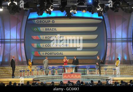 Group G, containing Brazil, North Korea, Ivory Coast and Portugal, is shown on the large TV Screen during the 2010 FIFA World Cup Draw at the Cape Town International Convention Centre, Cape Town, South Africa. Stock Photo