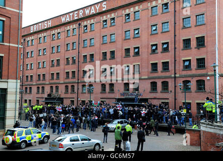 Police watch the English Defence League protesters on the waterfront in Nottingham. Stock Photo