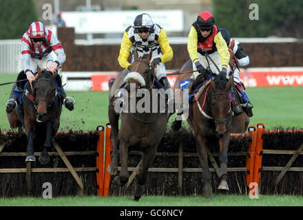 Quartano ridden by Paddy Brennan (centre) goes on to win the Artemis Fund Managers Hindu Kush National Hunt Novice's Hurdle at Plumpton racecourse. Stock Photo