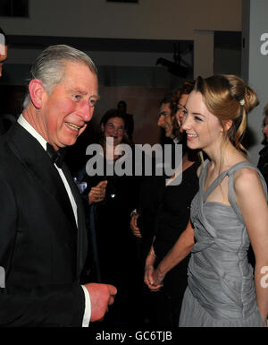 The Prince of Wales meets actress Saoirse Ronan, after he and the Duchess of Cornwall arrived at the Odeon Leicester Square in central London, for the Royal Film Premier of The Lovely Bones. Stock Photo