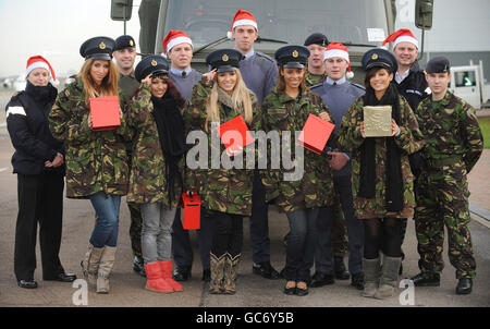 (left to right) Una Healy, Vanessa White, Mollie King, Rochelle Wiseman and Frankie Sandford of girl group The Saturdays arrive at RAF Northolt, west London to launch this year's uk4u Thanks! gift box campaign. Stock Photo