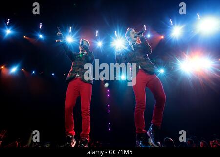 John and Edward Grimes, aka Jedward, performing during Capital FM's Jingle Bell Ball at the O2 Arena in London. Stock Photo