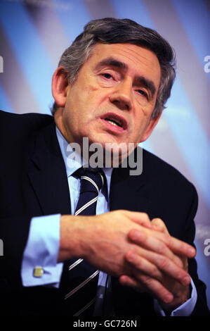 Prime Minister Gordon Brown answers questions after delivering a speech on Smarter Government during which he announced cuts in government spending and a greater moves to making information available via the world wide web. Stock Photo