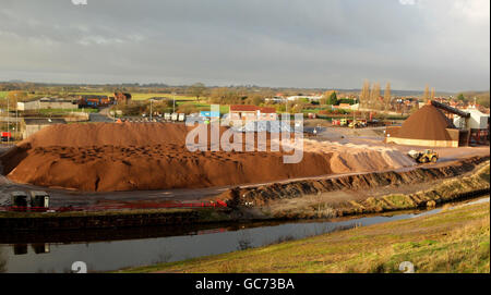 Salt for gritting the roads is piled up at the Salt Union mine in Winsford Cheshire, as weather experts predict a downturn in temperatures. Stock Photo