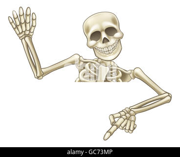 A skeleton cartoon character peeping over a sign waving and pointing down at it Stock Photo