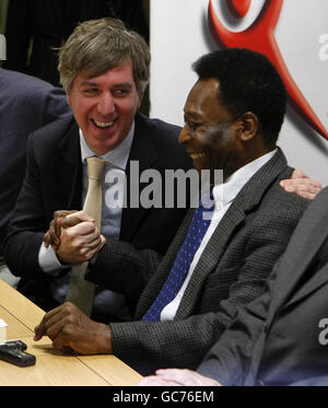 Brazilian soccer legend Pele with FAI Chief executive John Delaney (left) during a press conference ahead of the fundraiser 'An Evening With Pele' in aid of Our Lady's Children's Hospital, Crumlin, and Little Prince Children's Hospital in Brazil, at the Children's Medical Research Foundation, Dublin. Stock Photo