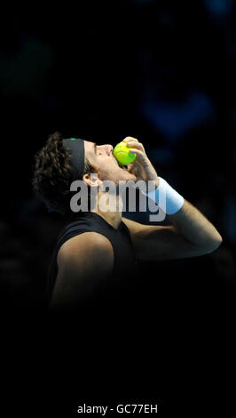 Argentina's Juan Martin Del Potro reacts as he competes against Robin Soderling during the Barclays ATP World Tennis Tour Finals at the O2 Arena, London. Stock Photo