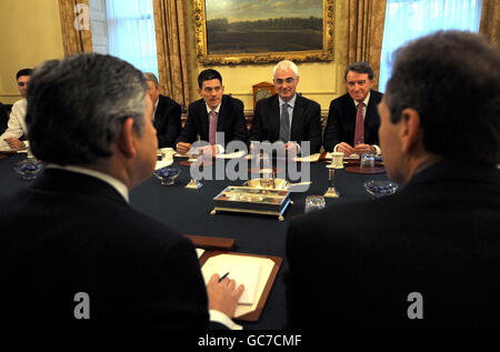 Britain's Prime Minister Gordon Brown holds a cabinet meeting at 10 Downing Street ahead of Chancellor Alistair Darling's (centre) pre-budget report later today. Stock Photo