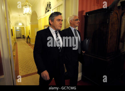 Chancellor Alistair Darling (right) arrives with Prime Minister Gordon Brown (left for a cabinet meeting at 10 Downing Street ahead of his pre-budget report later today. Stock Photo