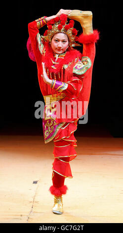A performer with the Chinese State Circus performs at a press preview for their performance of 'Mulan' featuring the Shaolin Warriors, at Blackheath, London. Stock Photo