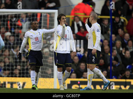 Tottenham Hotspur's Niko Kranjcar is congratulated by team mates Jermain Defoe (left) and Alan Hutton (right) after scoring the opening goal during the FA Cup Third Round match at White Hart Lane, London. Stock Photo