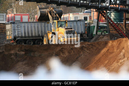 A truck is filled with grit from Salt Union at Winsford Rock Salt Mine in Cheshire. Stock Photo