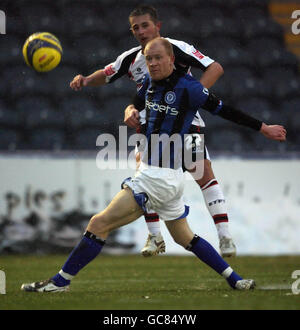 Soccer - Coca-Cola League Two - Rochdale v Shrewsbury Town - Spotland. Shrewsburys Waide Fairhurst and Rochdale's Jason Kennedy in action during the Coca-Cola League Two match at Spotland, Rochdale. Stock Photo