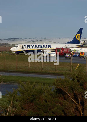 A Ryanair passenger jet carrying 129 people at rest 30 yards from Glasgow Prestwick airport's perimeter fence after skidding off the runway at 9am this morning. Stock Photo