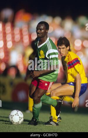 CAMEROON'S ROGER MILLA CELEBRATES SCORING THE WINNING GOAL IN THE SOCCER  MATCH AGAINST COLOMBIA Stock Photo - Alamy