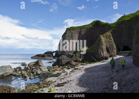 Cushendun cove caves Stock Photo