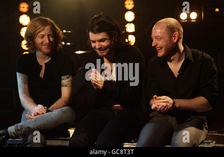 Biffy Clyro (left to right) James Johnston, Simon Neil and Ben Johnston during a recording for Channel 4's T4 programme, at Princess Productions in west London. Stock Photo