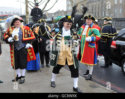 Town criers arrive at the funeral mass of colleague Peter Moore, at St George's Cathedral, Southwark. Stock Photo