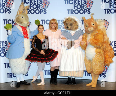 Actress Joanna Lumley accompanies Roberta Marquez, Principal with the Royal Ballet and character dancers from the tales of Beatrix Potter, (from left), Peter Rabbit, Mrs Tiggywinkle and Squirrel Nutkin at the Royal Opera House in London to announce a special Valentine's Day family performance of opera La Boheme, and ballet The tales of Beatrix Potter at the opera house which has donated the entire auditorium to the Tickets for Troops charity. Stock Photo