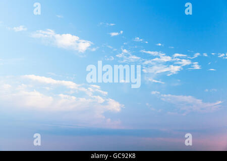 White clouds in bright colorful sky, natural photo background Stock Photo