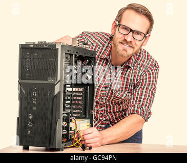 Male technician with computer. Toned image. Stock Photo