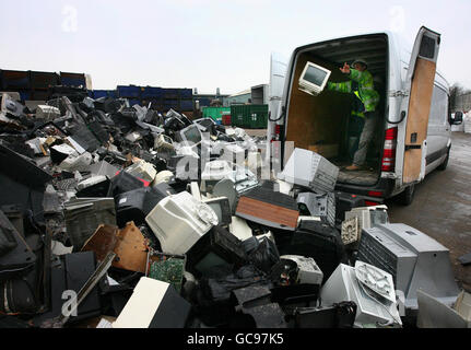 A delivery of old television sets and computer monitors is made at recycling company SWEEEP in Sittingbourne, Kent, as the demand for flat panel screens sees the company currently recycling 4,000 of the old or broken screens every 24 hours. Stock Photo